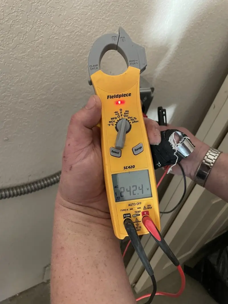 Voltage testing with clamp meter during Electrical Installation Services in Maitland